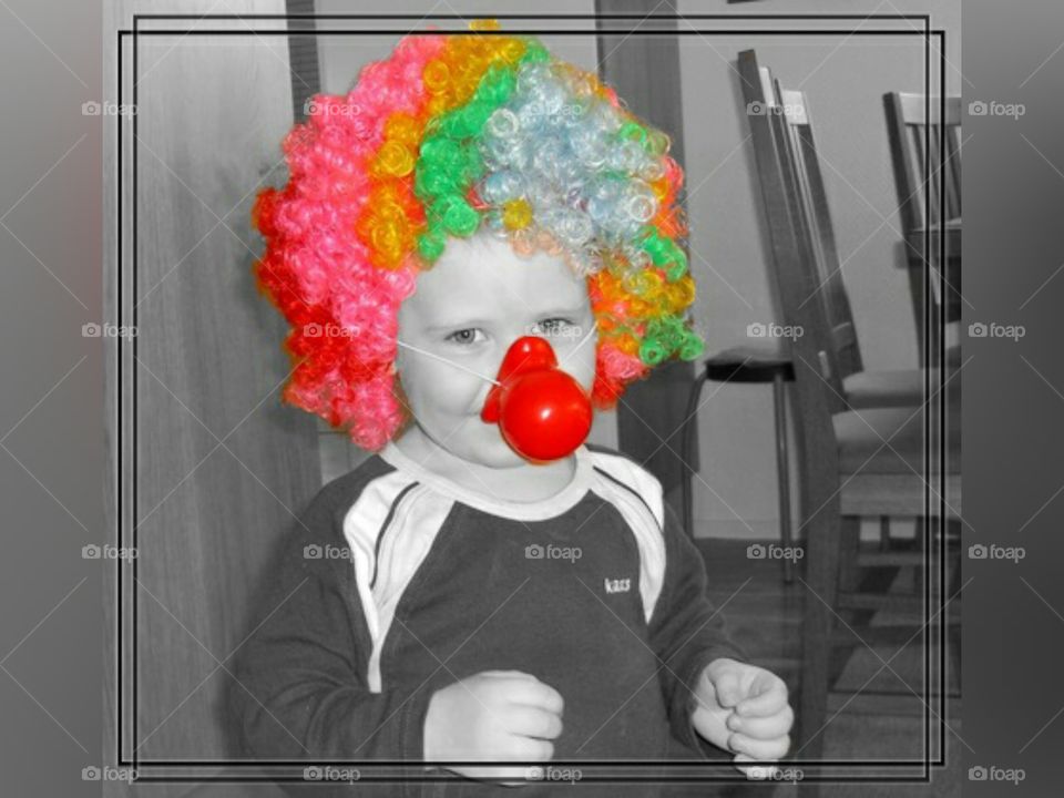 Portrait of little boy clown nose
