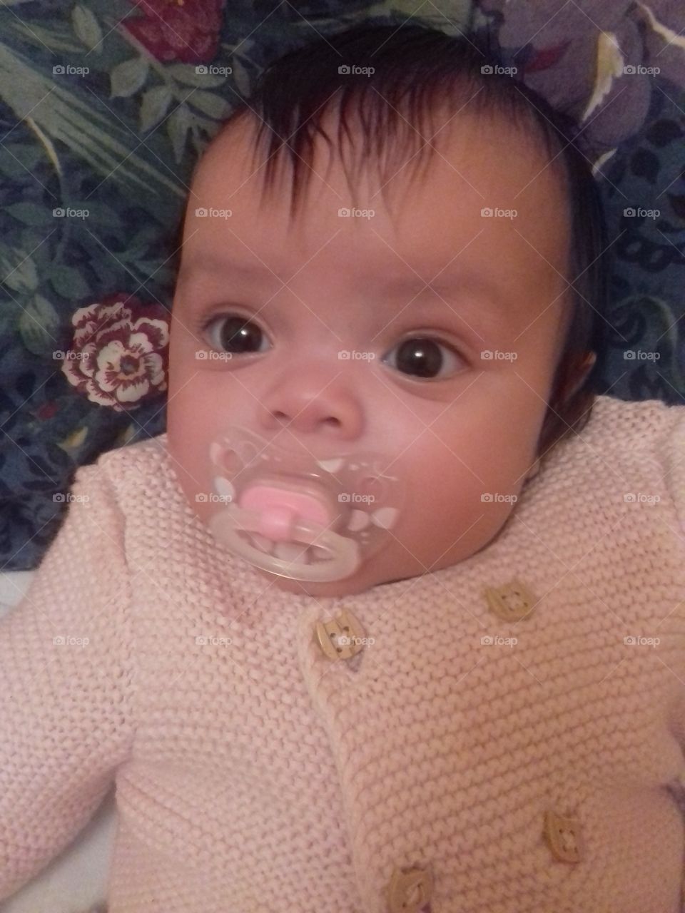 wearing her sweater for winter and take her pacifier