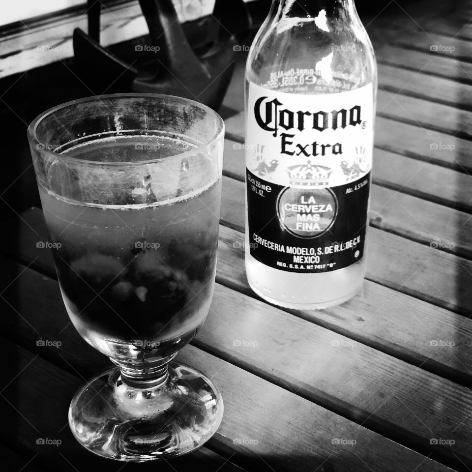 Bottle of corona and glass of punch