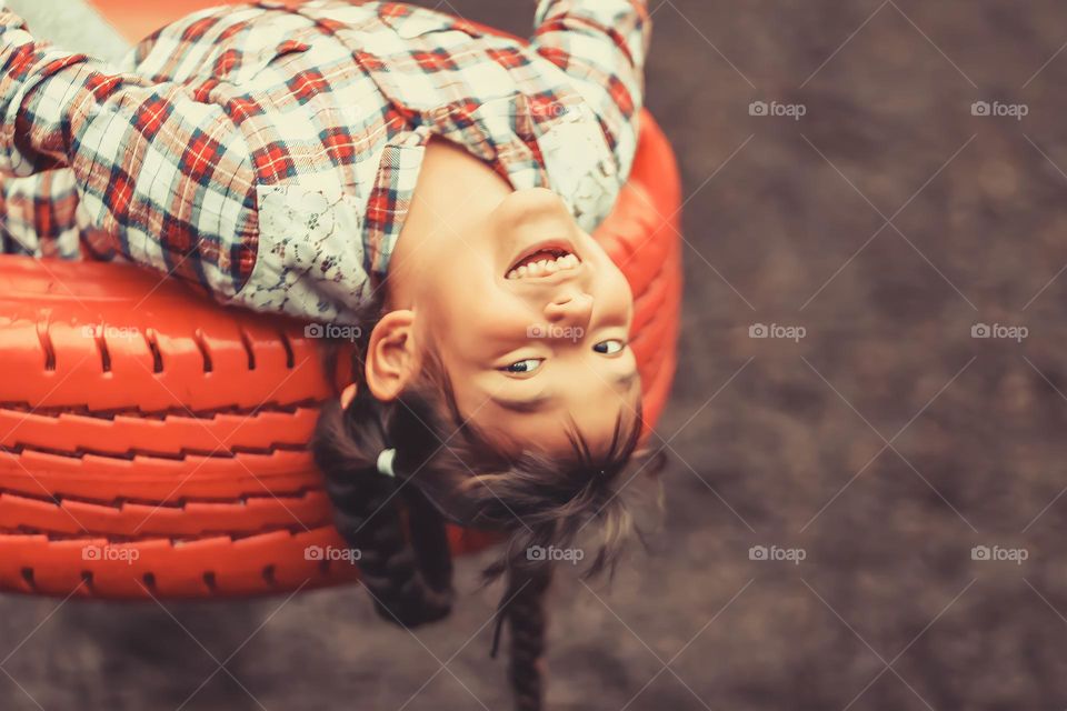 Cute little girl on a playground
