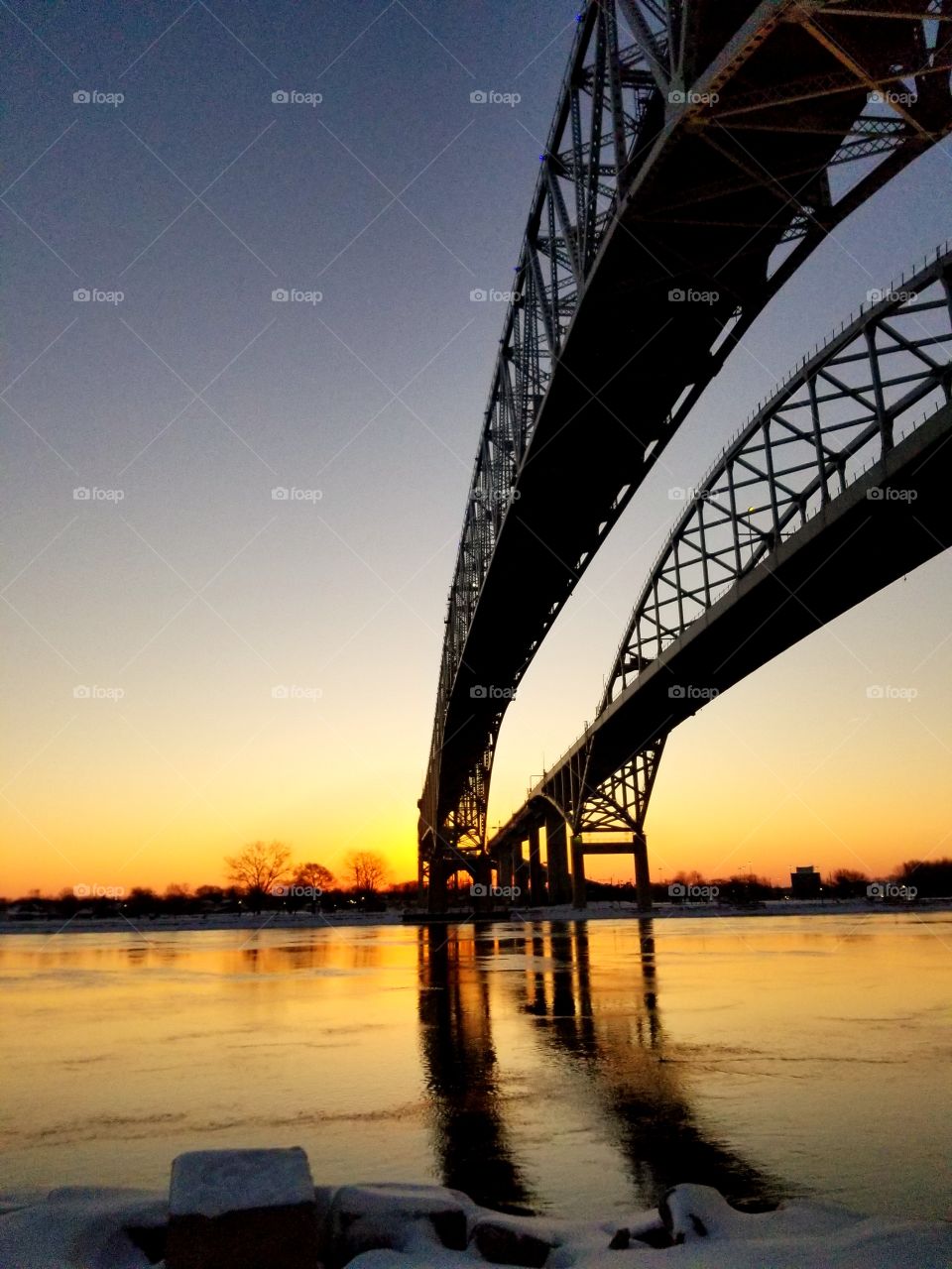 Bridges over a calm river