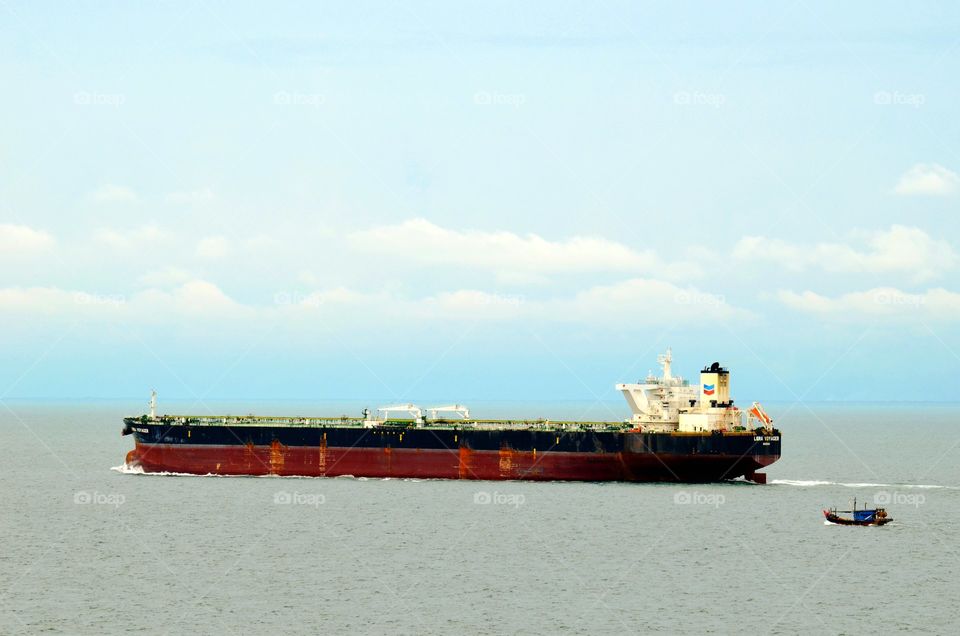 Ship passing through Malacca Straits