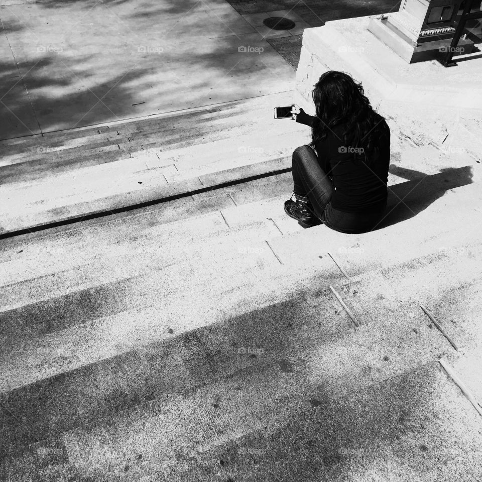 Sitting on Steps. Girl sitting on Steps