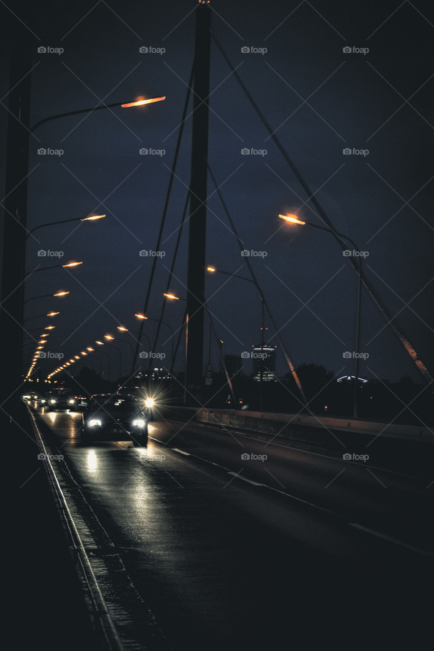 Traffic at night on bridge