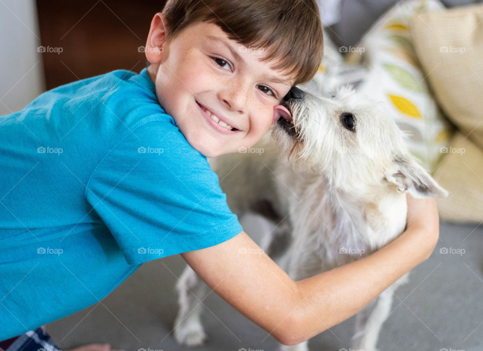 Kisses from his doggie