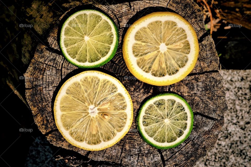 Lemons And Limes On A Log, Food Portrait, Healthy Eating, Farm Fresh Foods, Fruits On Display