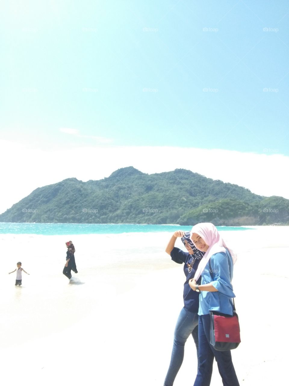 Lampuuk Beach is one tourist attraction located on the west coast of Aceh, about 15 km from the city of Banda Aceh, precisely in Meunasah Masjid, Lhoknga, Aceh Besar. The location is also close to the Banda Aceh - Calang (Aceh Jaya).

When the tsunami hit this place was in ruins and was closed temporarily for recreation. However, after doing construction and repair, then the location is a beautiful beach Lampuuk again.
Lampuuk beach that extends from north to south, has a beach with white sand and is located in the bay, so the place is very suitable as a recreation area beach, good for swimming or just enjoying the beautiful beach. The beach is also ideal for leisure activities such as banana boat and water sport surfing, as the waves are big and friendly.
Lampuuk beach section farthest left its own exoticism directly adjacent to steep and high walls. Blue water mixed with blue sky and green trees at the top of the steep hill adds to the beauty of this beach, especially when enjoyed in the afternoon or at sunset. Hence, many are calling this a Bali beach Lampuuk the people of Aceh. In addition, there are many foreign tourists who visit this place.
At this location there are also facilities such as public toilets, food stalls, and the inn-lodging (cottage) found around the coast Lampuuk. Near the beach there is also a white grand mosque, which is the only building left intact when the tsunami hit in 2006 ago, and is set by the government as a monument to the tsunami tragedy. The mosque is also a post-tsunami housing complex built as a form of assistance from the Turkish government.


Lampuuk has a beach with white sand and is located in the bay so the place is very suitable as a recreation area beach good for swimming or just enjoying the beautiful beach. Before the tsunami, this area is a traditional village with people who worked as fishermen, farmers cegkeh, SAI Cement factory workers etc.. Since the area is lo