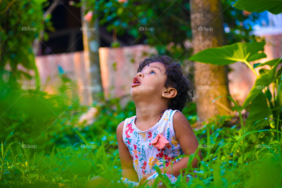 Small baby enjoying  with nature