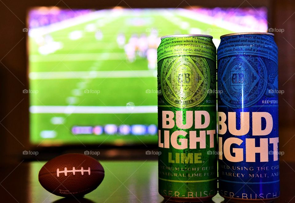 Watching football with Bud Light beer