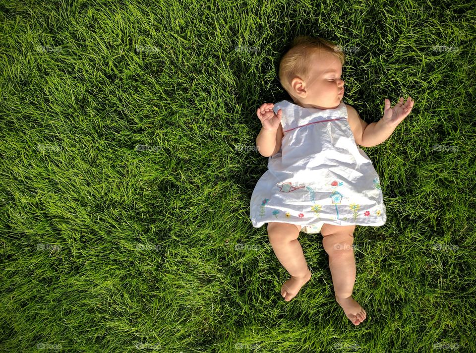Baby in the grass.