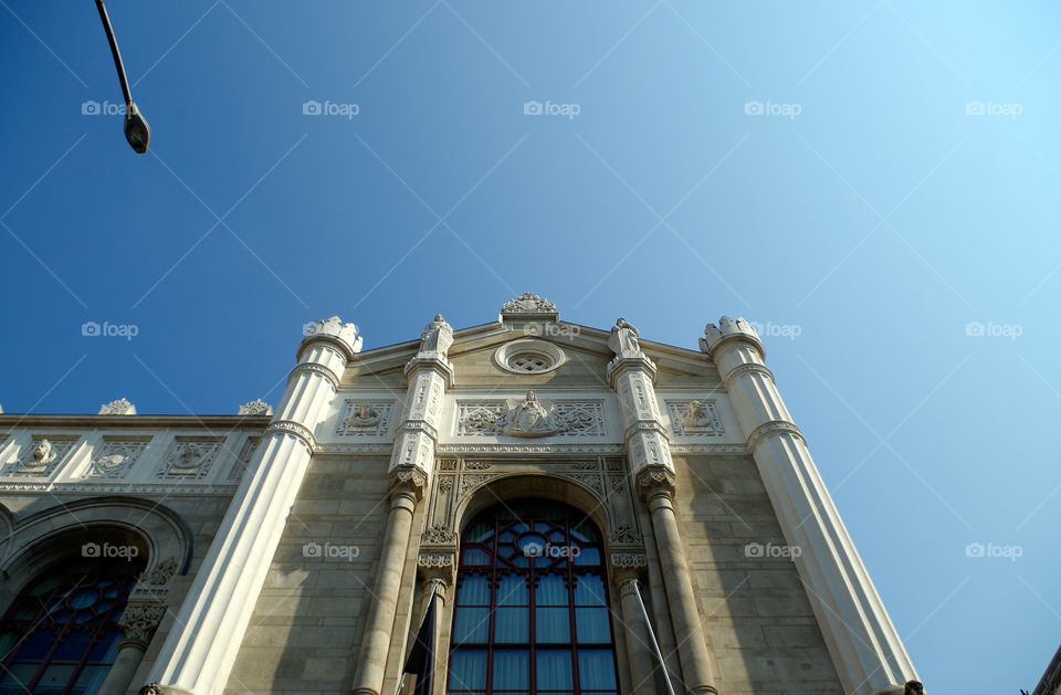 Low angle view of building in city against sky.