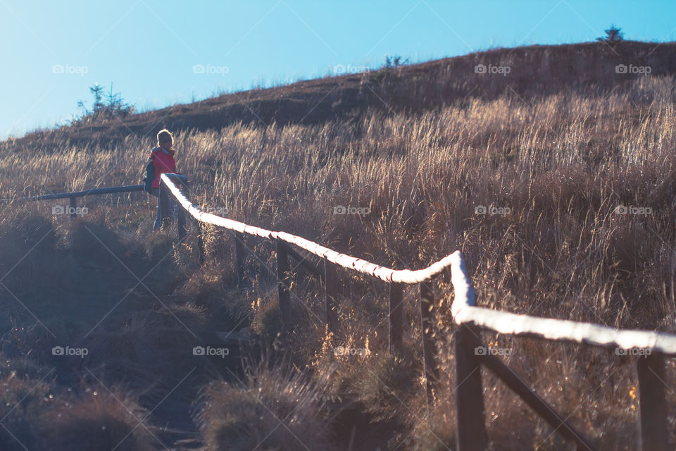 Woman on the mountain trail