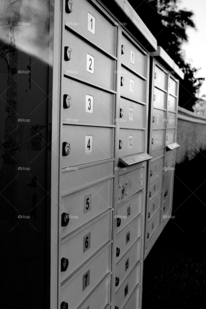 Mail box black and white in the neighborhood 