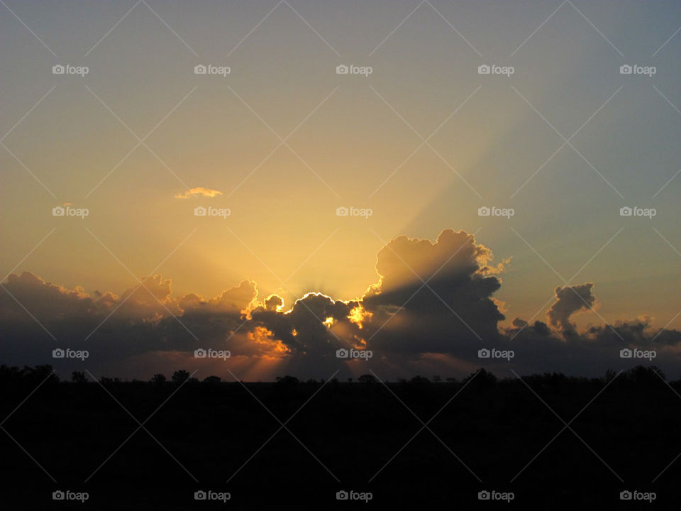 sky sunset clouds sun by la_hotsauce