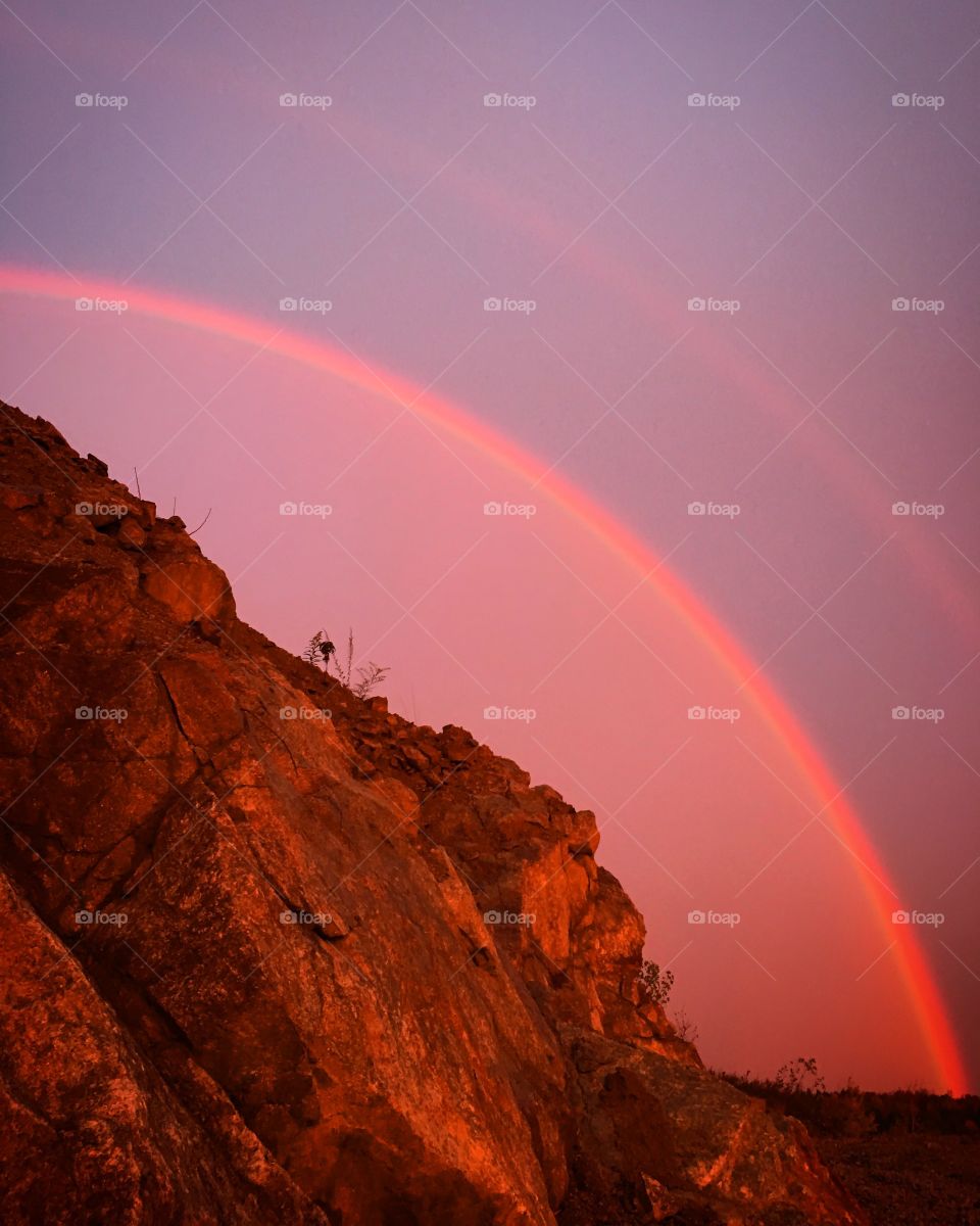 Rainbow over rock