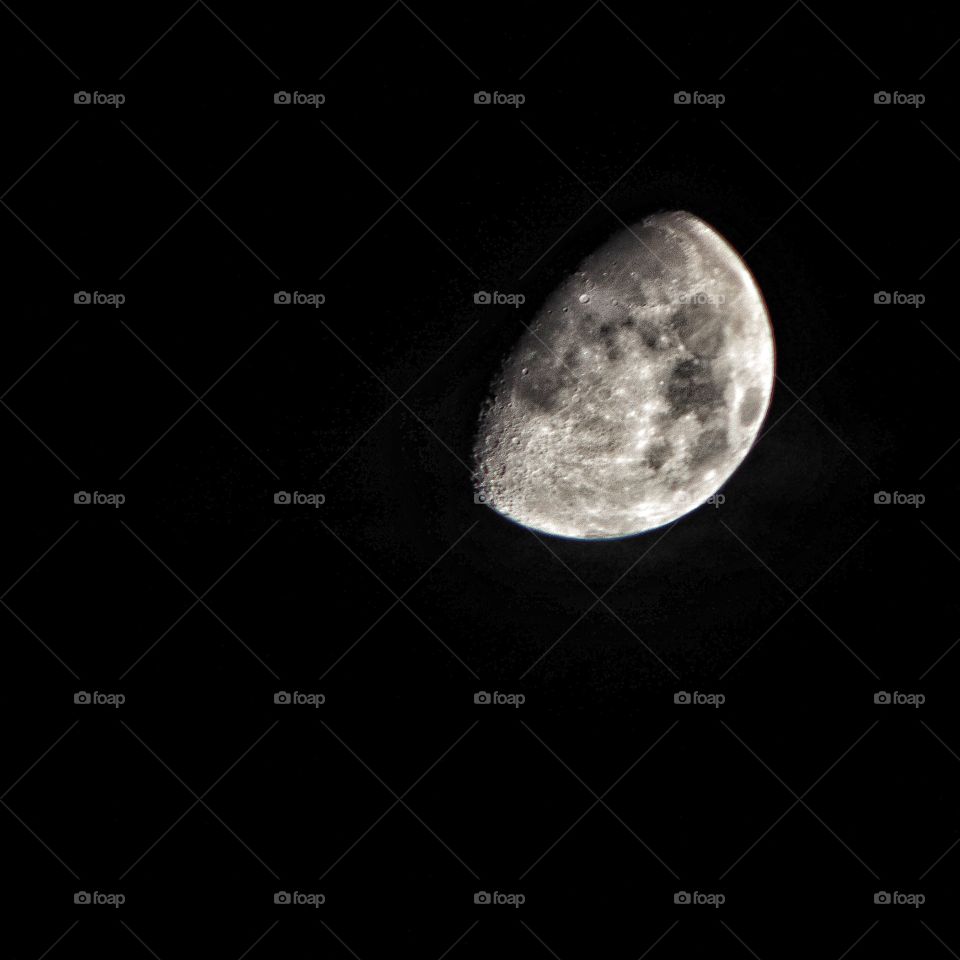 Half moon against sky at night