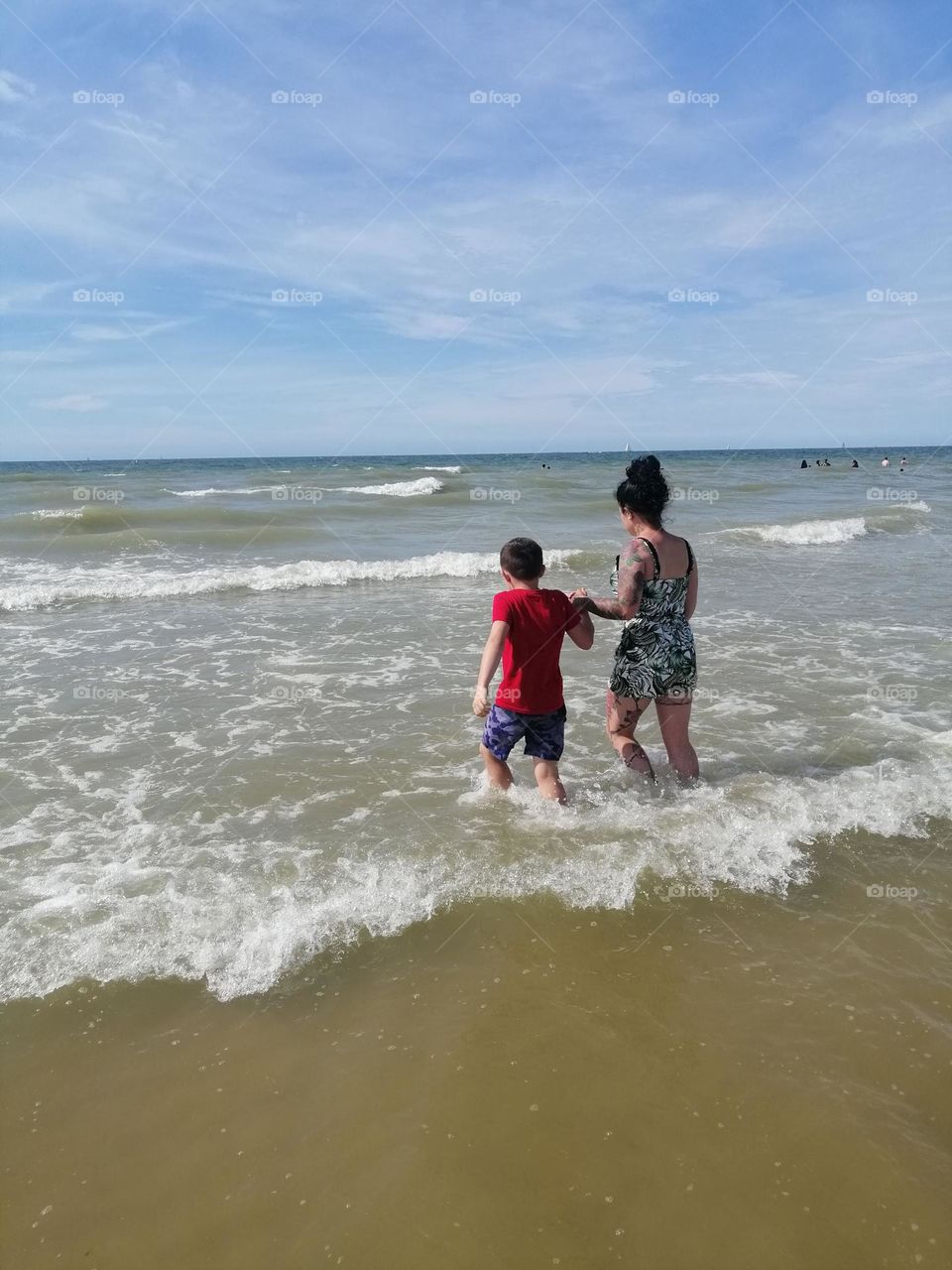 my wife and my son-in-law in the water