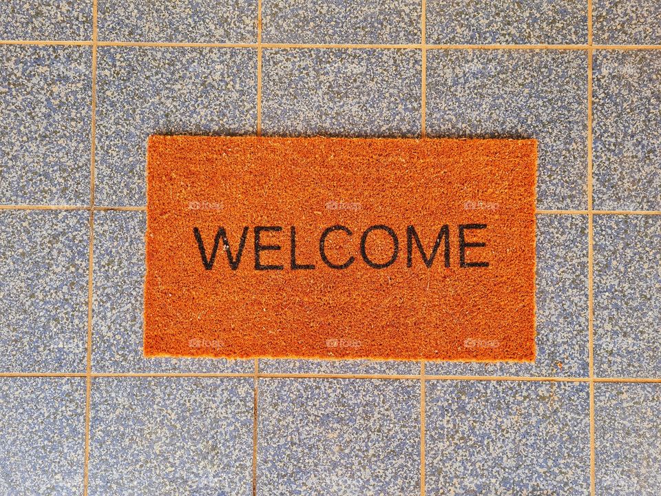 doormat with welcome inscription