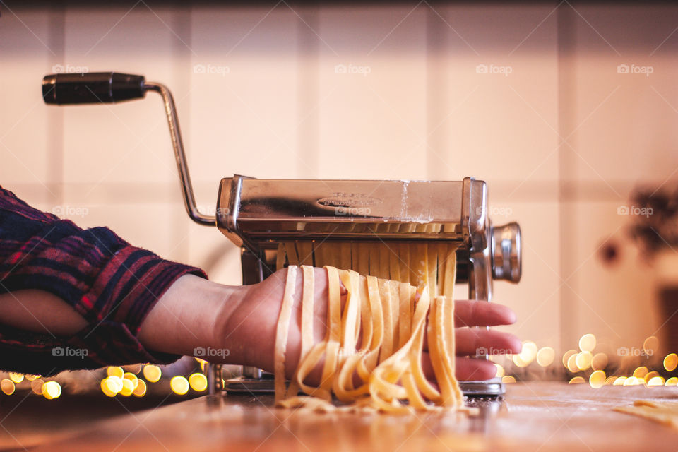 hand showing off some homemade pasta