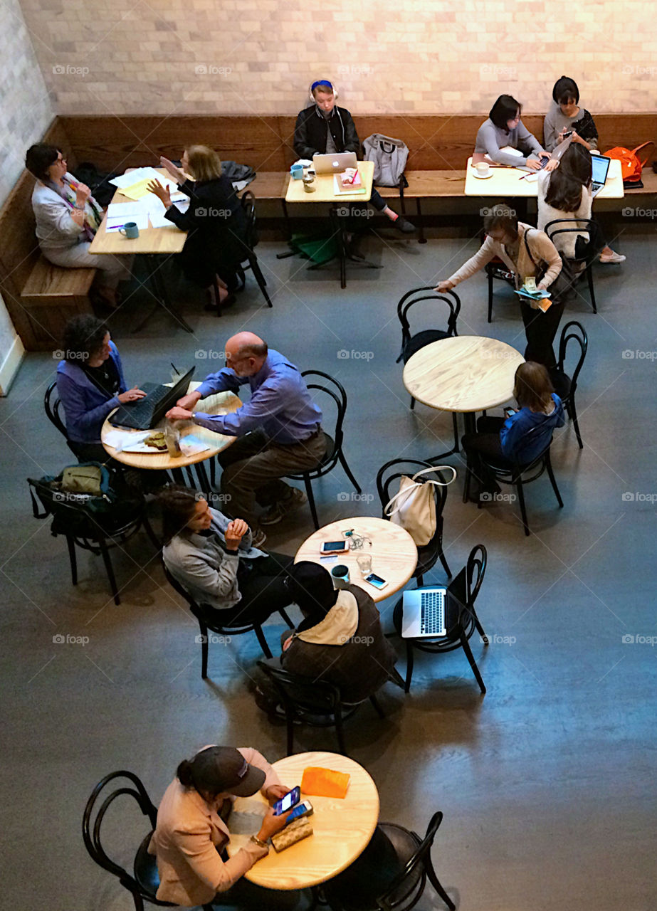 Cafe from above with guests on the tables