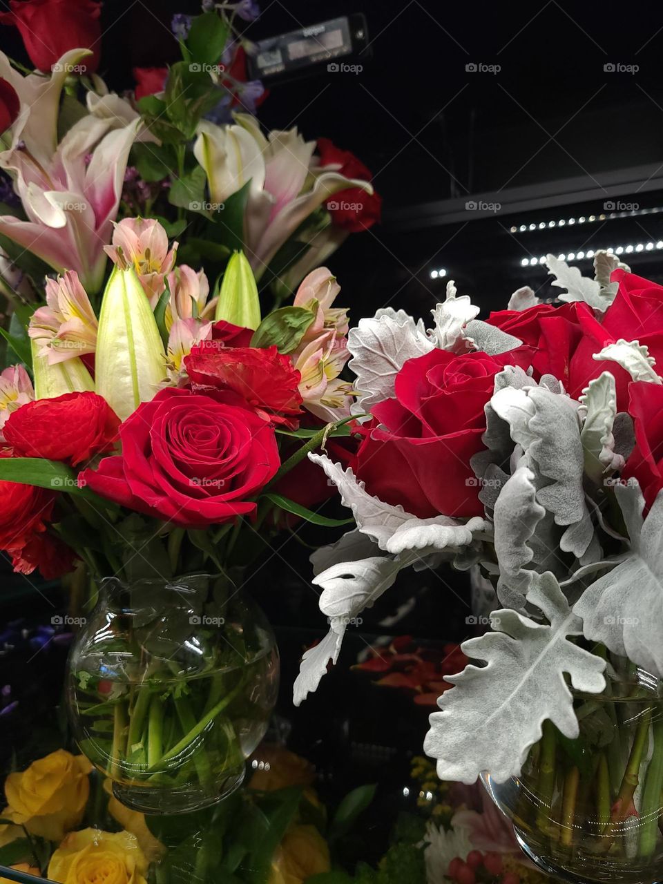 Beautiful spring flowers in various vases and vessels celebrating spring and Easter, with tulips, roses and the like