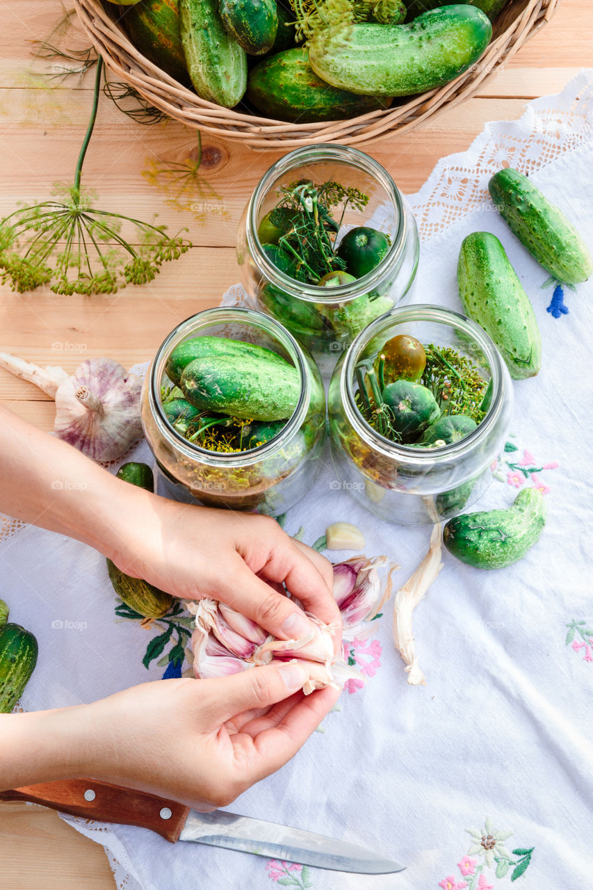 Pickling cucumbers. Pickling cucumbers with home garden vegetables and herbs