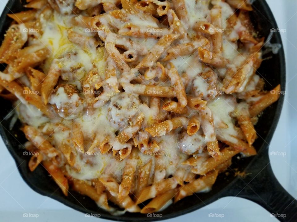 Penne and meatballs with asiago and fontina cheese