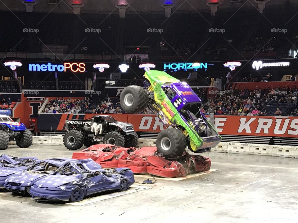 Monster truck jumping cars