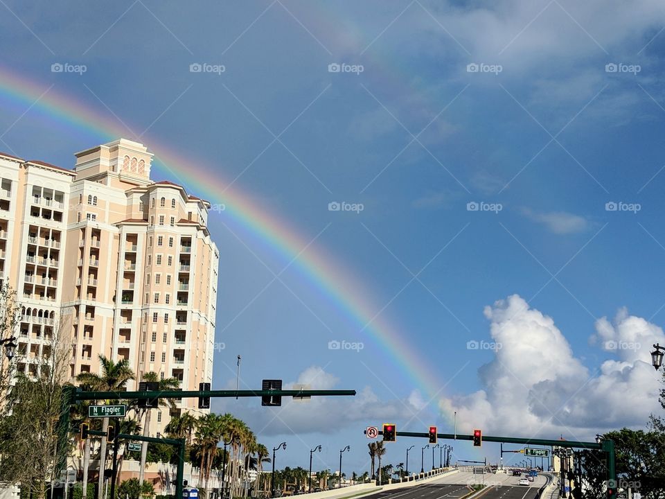 Florida rainbow over Flagler bridge Palm Beach