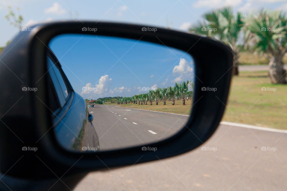 Looking through rear view mirror