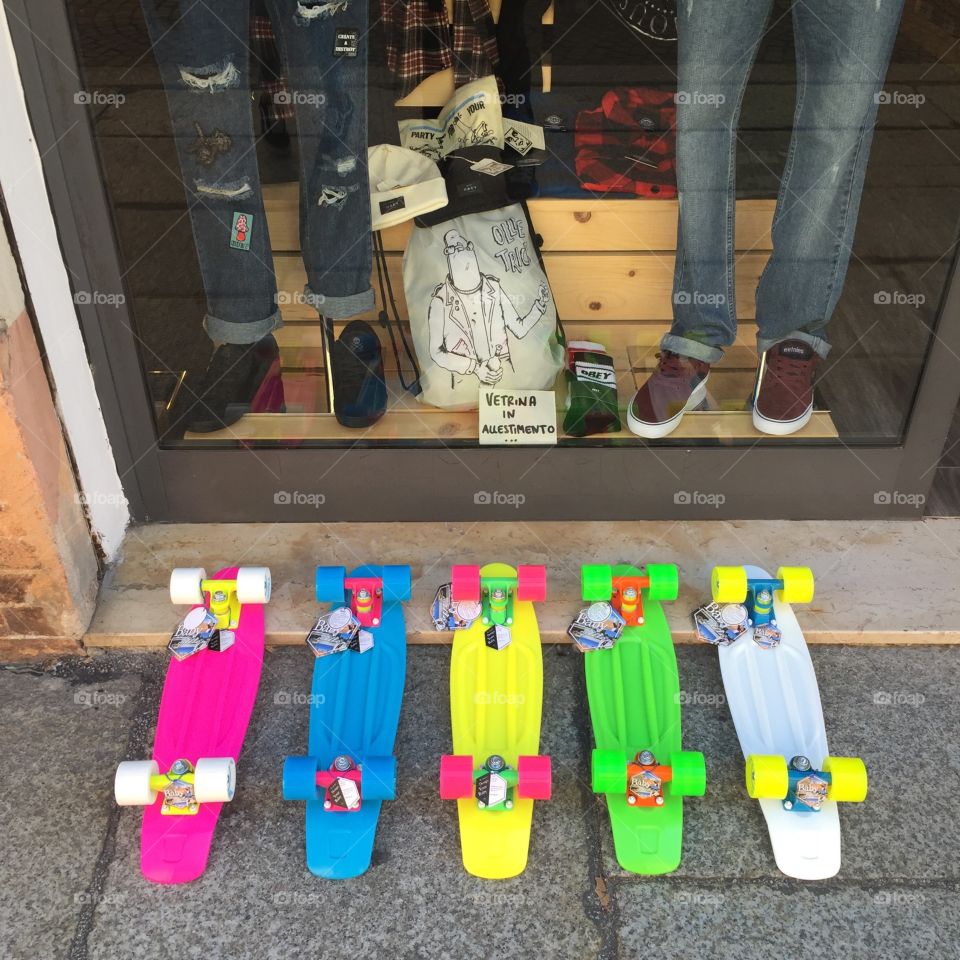 Colored skateboards outside the store