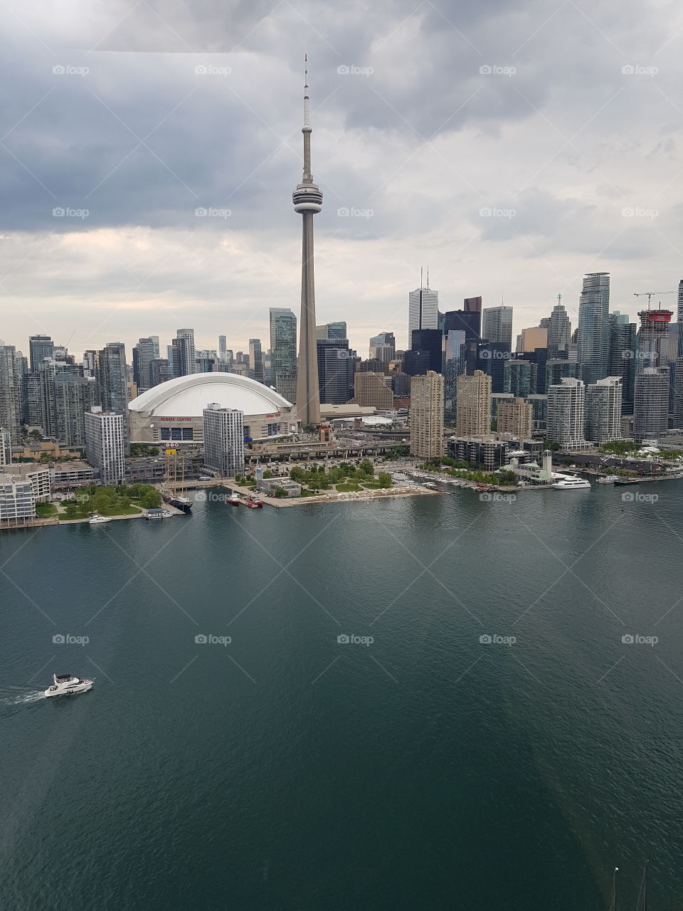 View of Toronto skyline from above, in a helicopter. Cloudy but beautiful weather.