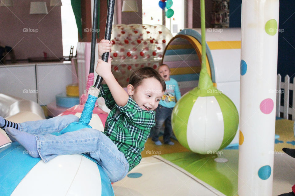 A child rides on attractions