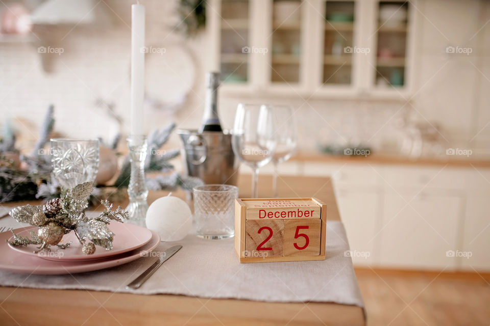 Christmas background with wooden block calendar with the date of December 25