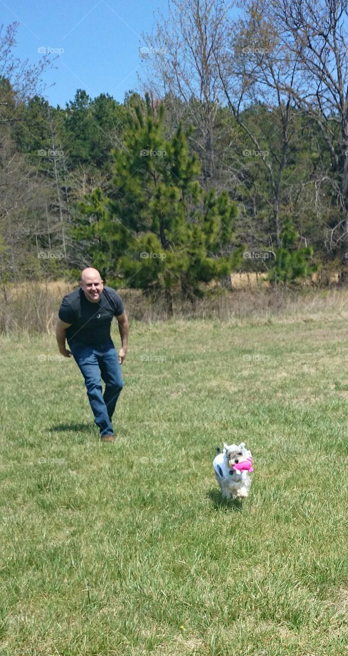 daddy and his four legged baby. our baby opened up her easter egg