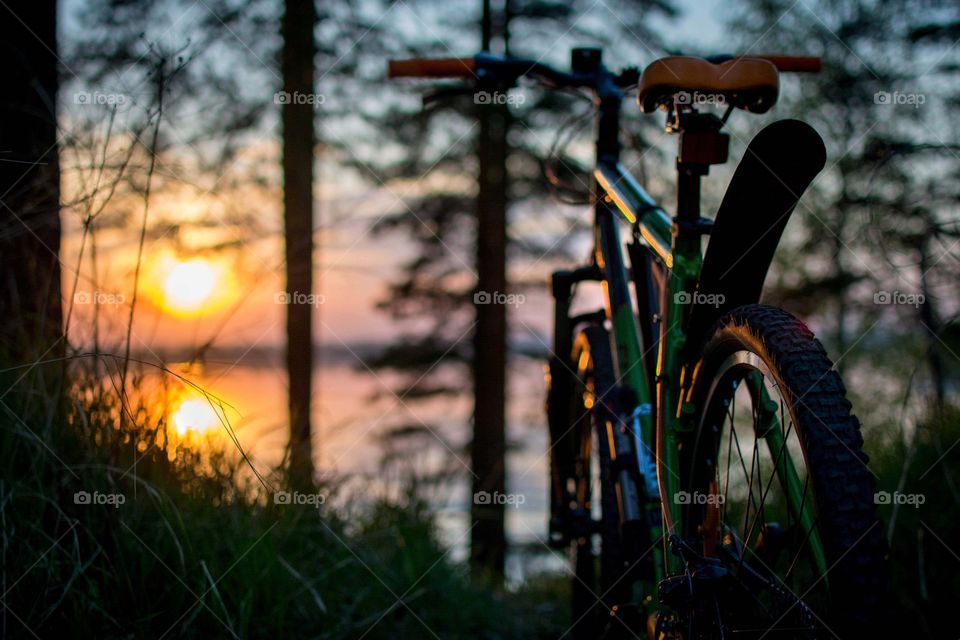 I love my bike and my camera. biking at a sunset
