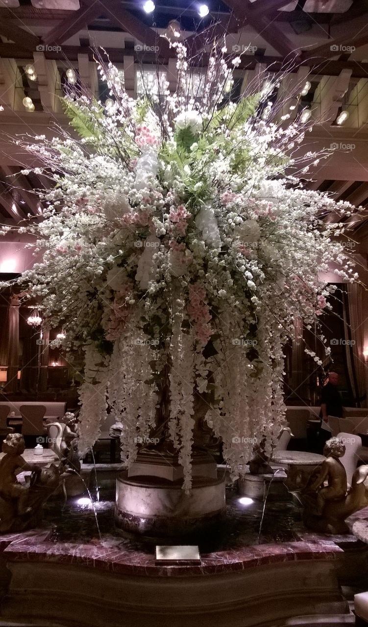 Magnificent Floral Arrangement! And Yes Those Are Dinner Tables In The Background...