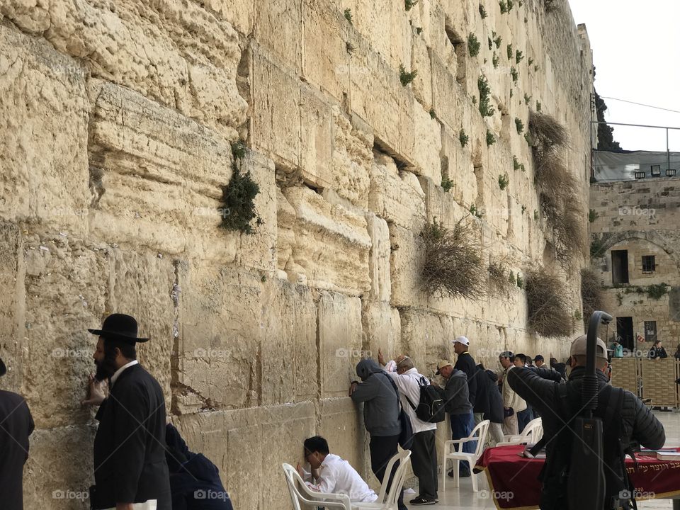 People Landmarks - Jews and Pilgrims pray at the Western Wall in Jerusalem, Israel.