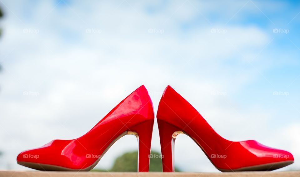 red shoe Blue Sky White clould wedding show female shoes