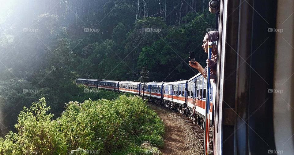 Exploring Sri Lanka's stunning upcountry vistas from the comfort of a train - a perfect blend of travel and tranquility