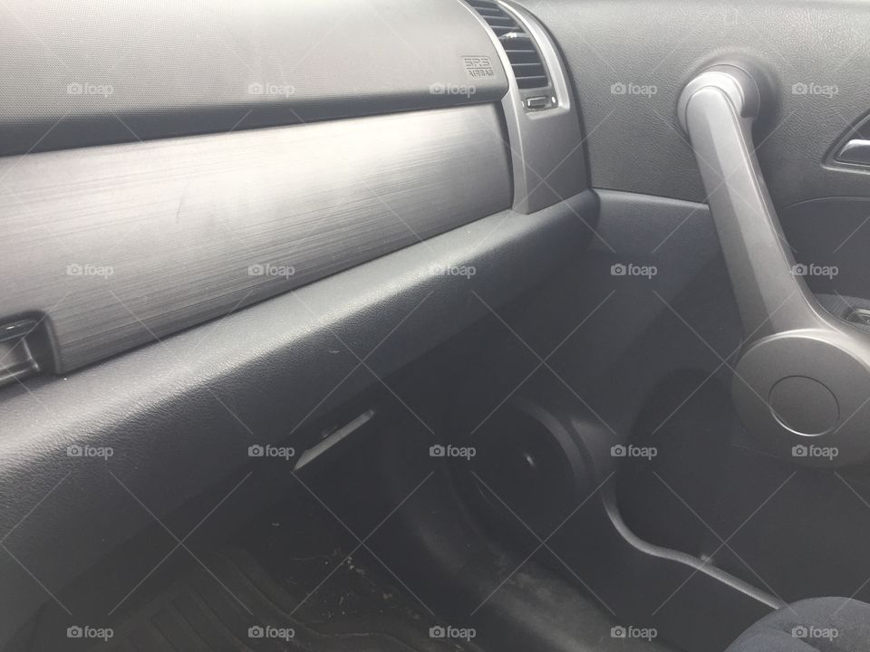 Car auto dashboard glove compartment view from driver seat