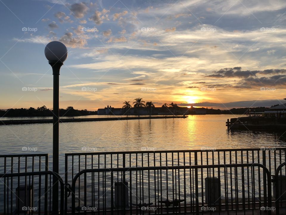 Seven Seas Lagoon near the Magic Kingdom at Walt Disney World, Lake Buena Vista, Florida. The photo was taken at sunset, and Disney’s Grand Floridian Resort is in the background. 