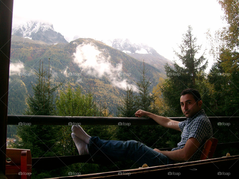 Relaxing and enjoying the view in Chamonix on a balcony in a Chalet