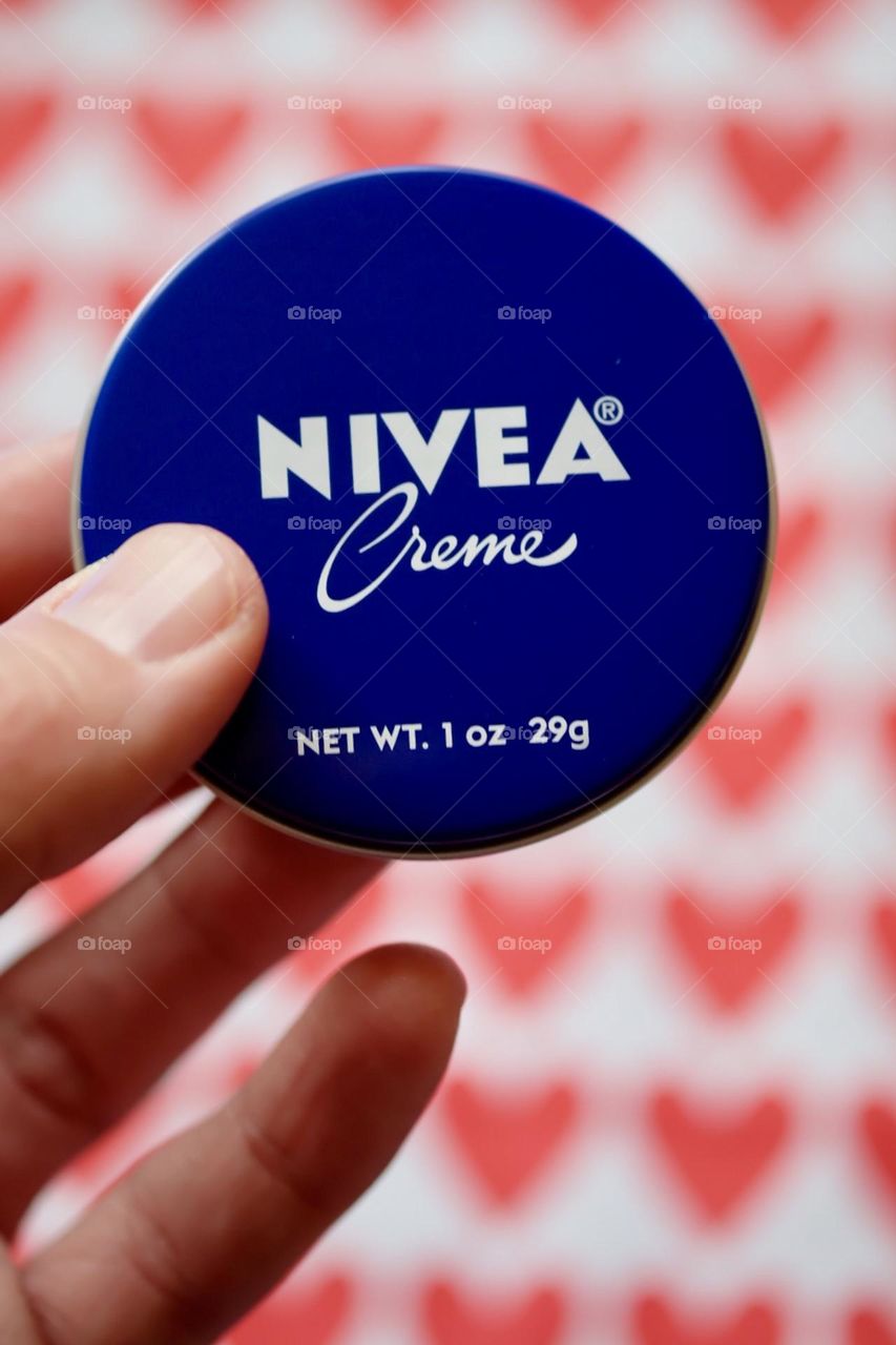 Nivea Crème product photo, woman’s hand holding Nivea Crème, favorite beauty products 