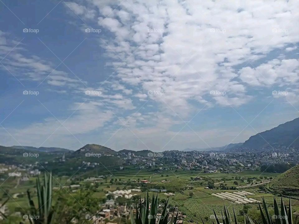 Glory be to God, the magnificent and picturesque view and the natural green trees are a view that is nothing more wonderful than it