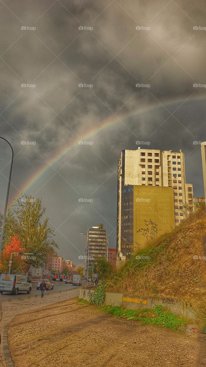 A rainbow over the city