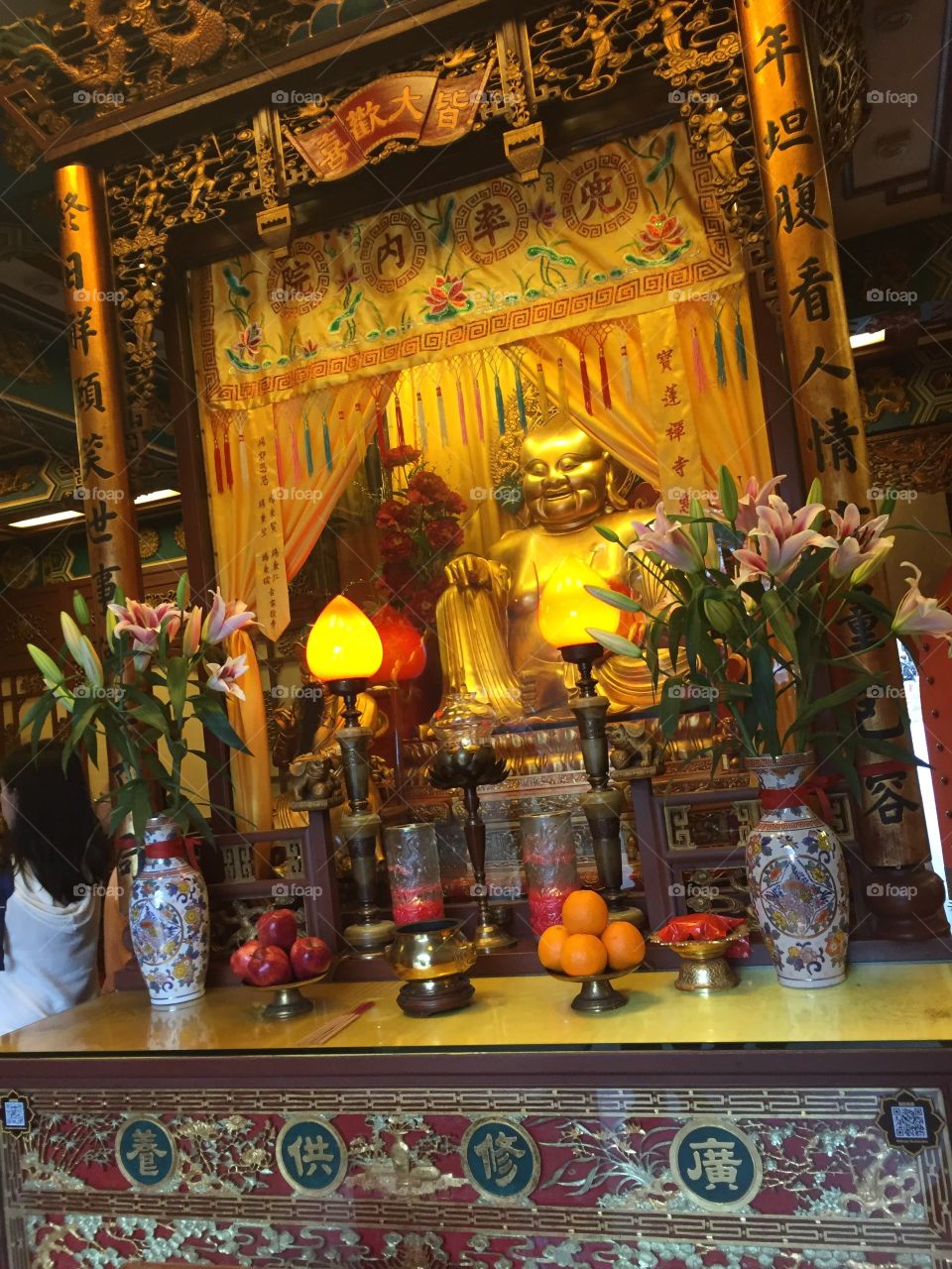 Buddha Shrine. Food is given to Buddha to thank him for giving food to The people. Ngong Ping Village, Po Lin Monastery, Lantau Island, Hong Kong. 