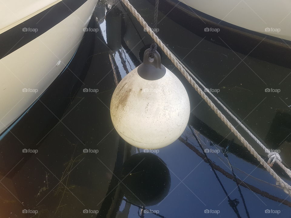 A fender for shipping for in the harbor.