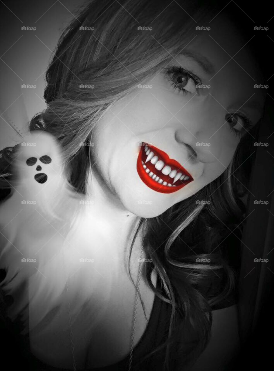 Halloween inspired photo edit. Young vampire woman. 