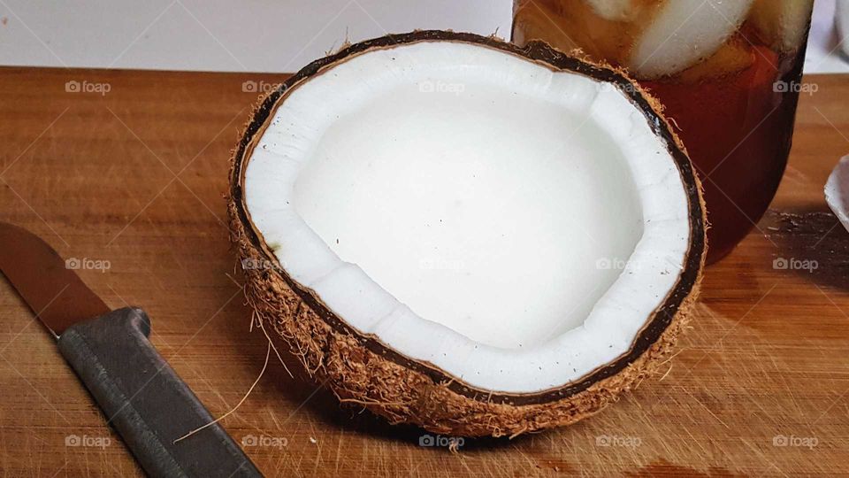 Coconut on wooden table